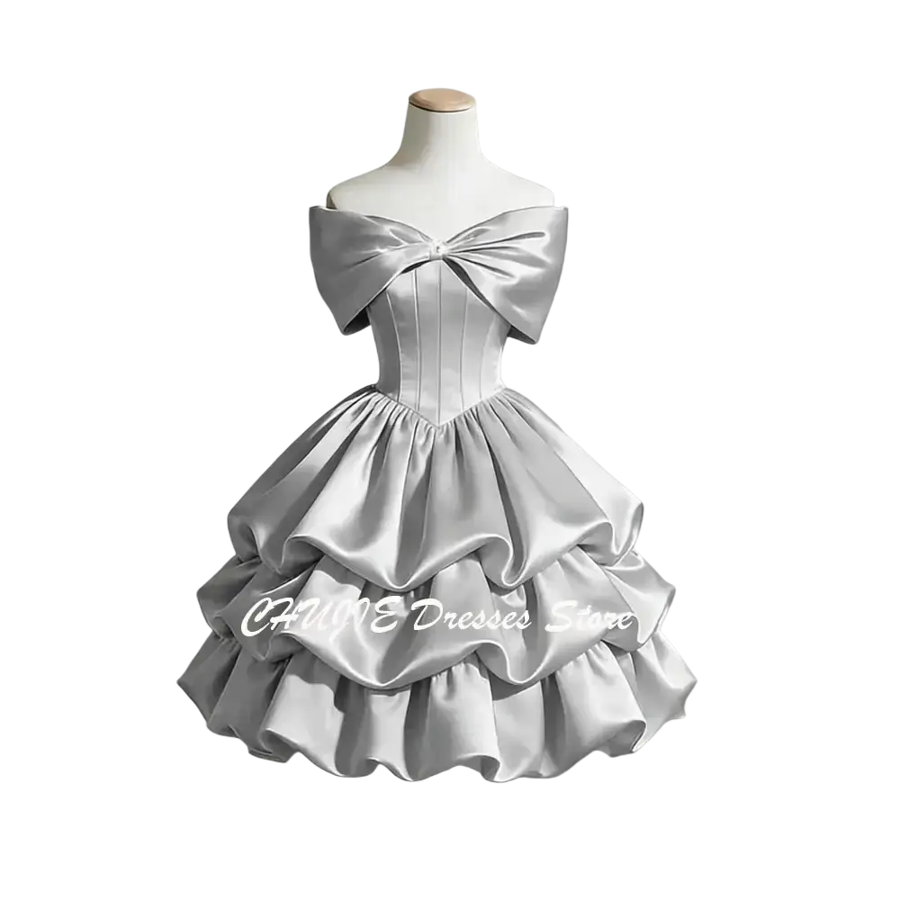 Off-shoulder silver satin graduation dress with corseted bodice and tiered ruffle skirt for satin graduation events