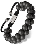 Adjustable shungite emf protection beaded bracelet with black matte spherical beads on braided cord and silver metal accents