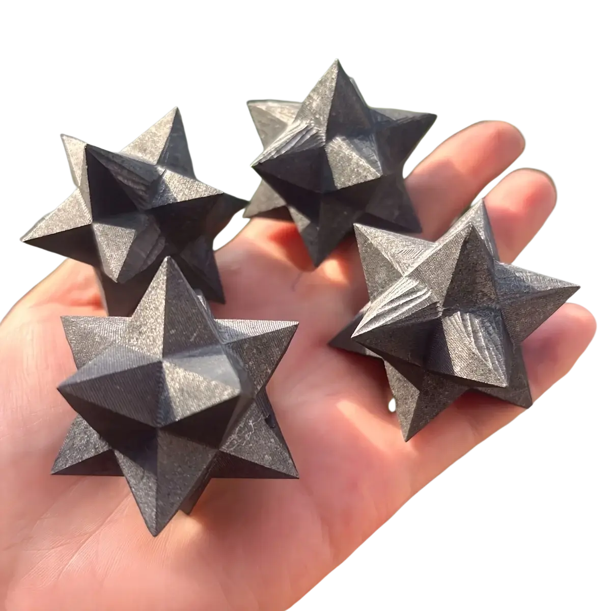 Black shungite merkaba crystal with metallic sheen and layered facets for elegant home decor and decoration style