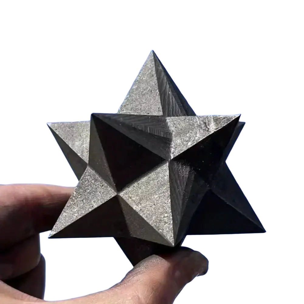 Shungite merkaba crystal home decor featuring a metallic geometric star with textured surface and sharp edges for decoration style