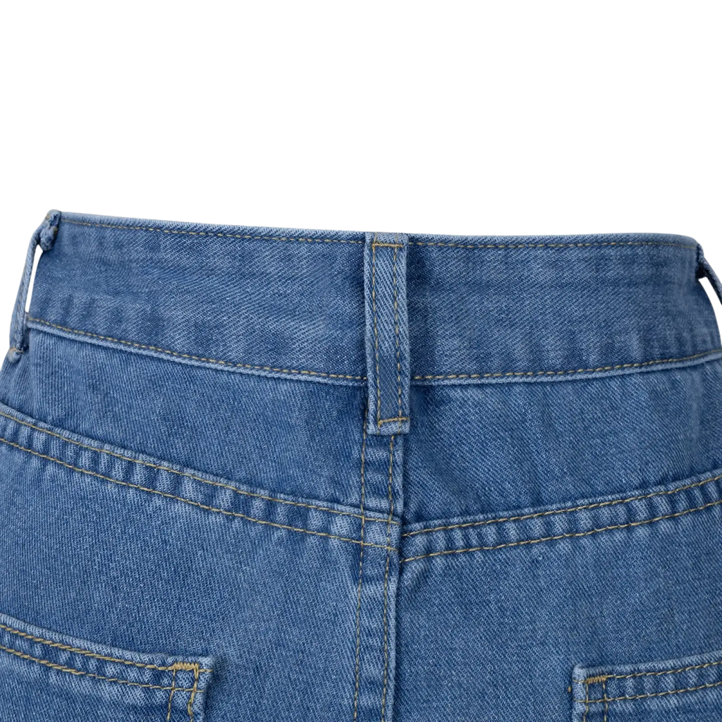 Side slit wide leg denim jeans in classic blue wash with mid waist and contrasting stitching