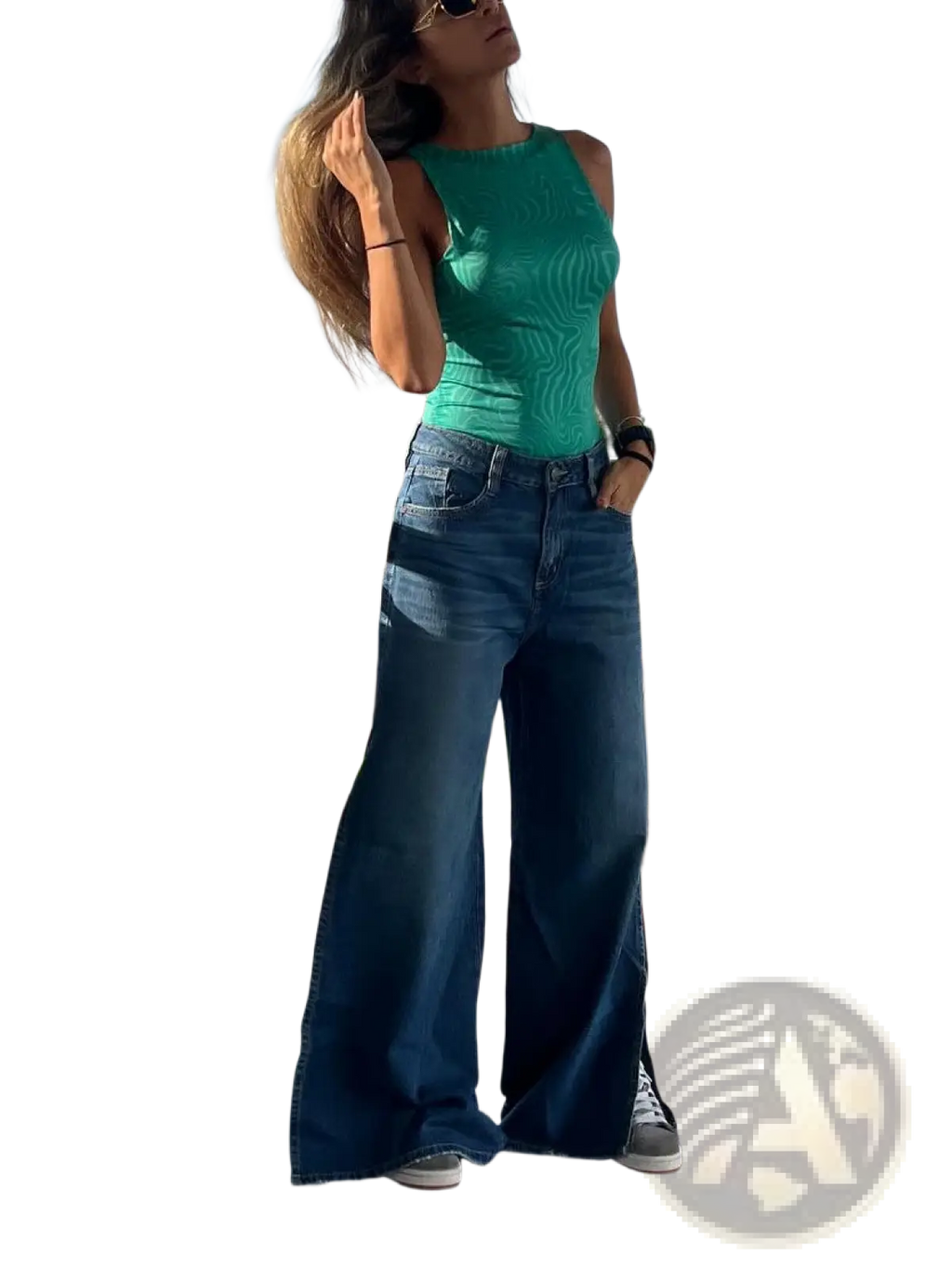 A pair of high waist side slit wide leg denim jeans in classic blue wash with visible stitching