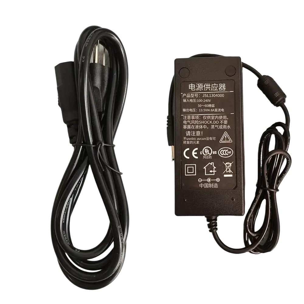 Black plastic signal fire fusion splicer power adapter 12v 8a with coiled cables and standard plug shown from the back side
