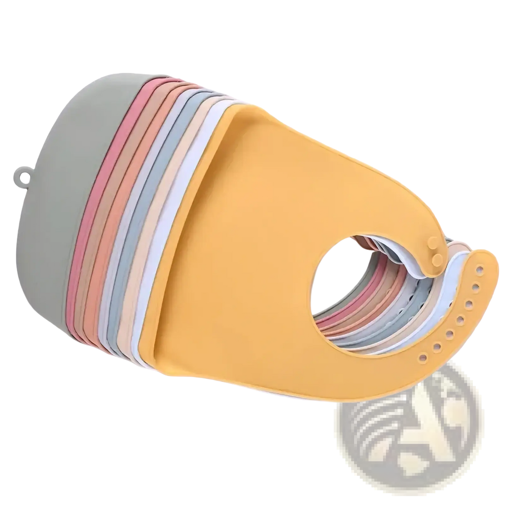 A stack of colorful silicone baby feeding bibs in pastel beige with waterproof material and adjustable snap closures