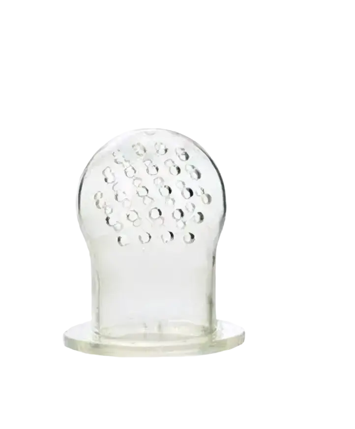 Clear silicone baby fruit feeder and teether with rounded top featuring small circular indentations and flat base