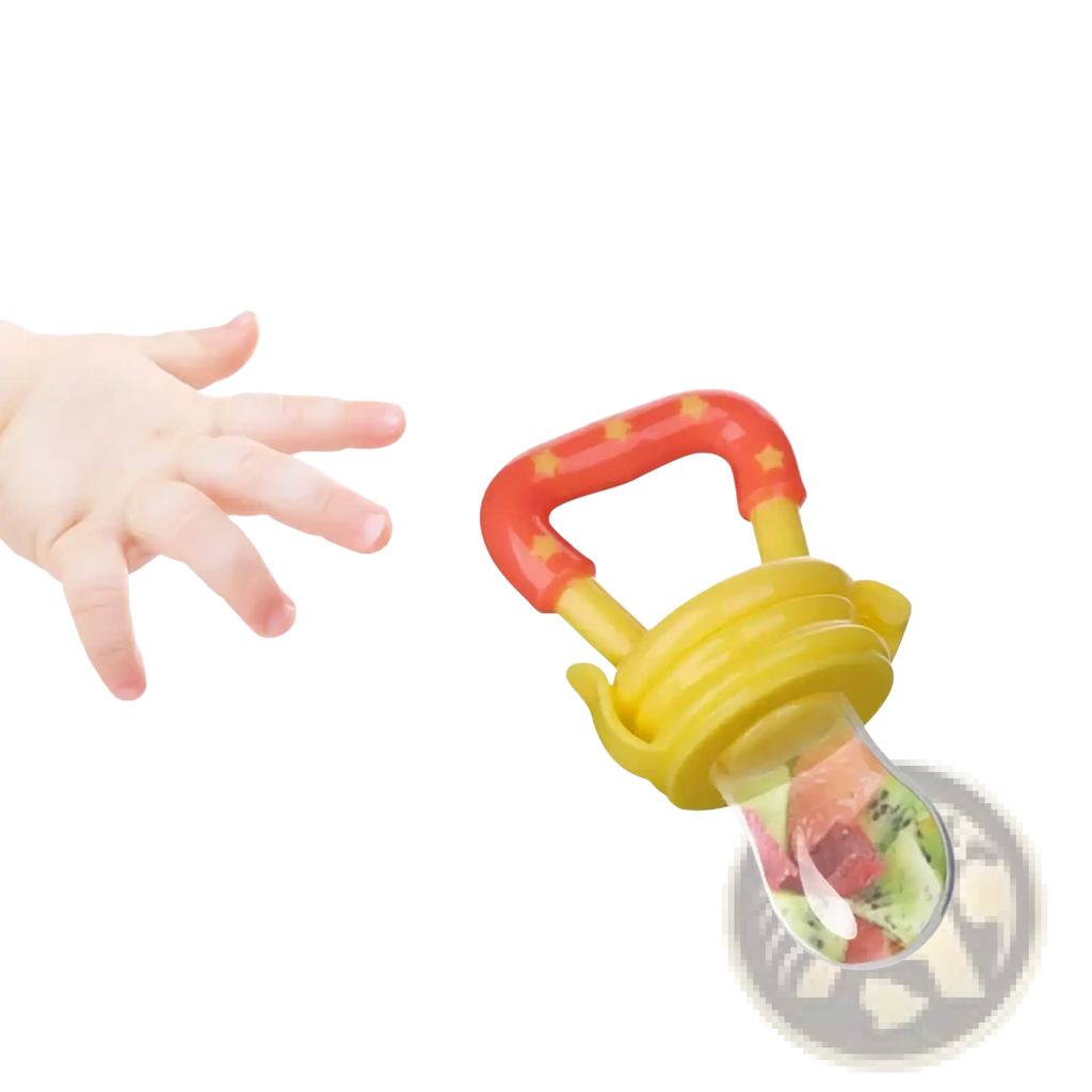 Silicone baby fruit feeder and teether spoon with bright red and yellow silicone and clear compartment holding chopped fruit