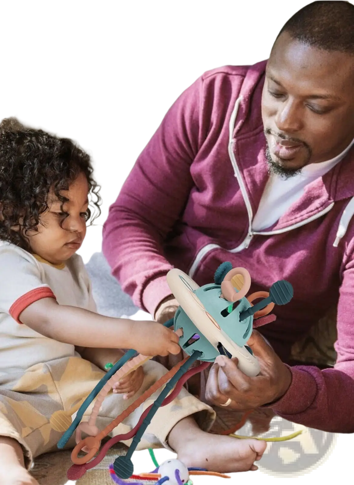 Silicone baby sensory teething toy with teal wooden base and colorful flexible ribbons for tactile stimulation