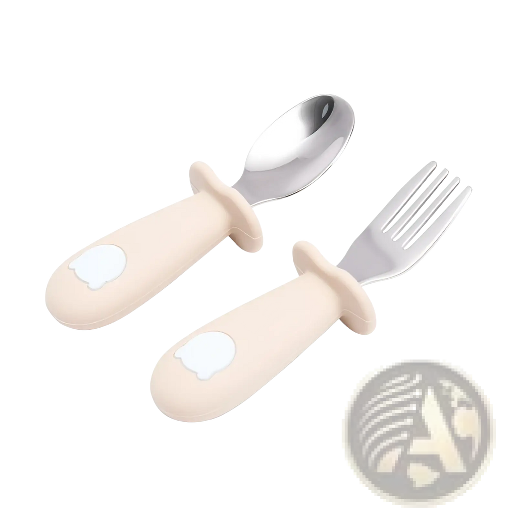 Cream-colored silicone handles with white bear face design on stainless steel baby spoon and fork cutlery set