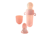 Pink silicone baby squeeze feeding bottle with clear dotted teething ball and matching handles for easy grip