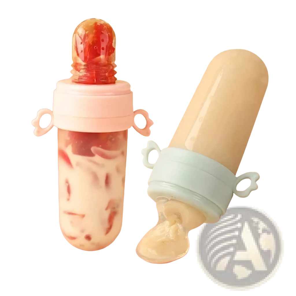 Silicone baby squeeze feeding bottle and spoon feeder with pink and light blue silicone grips and red strawberry top