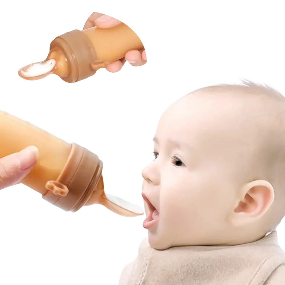 Tan silicone baby squeeze feeding bottle with spoon-like spout and ergonomic grip for easy feeding