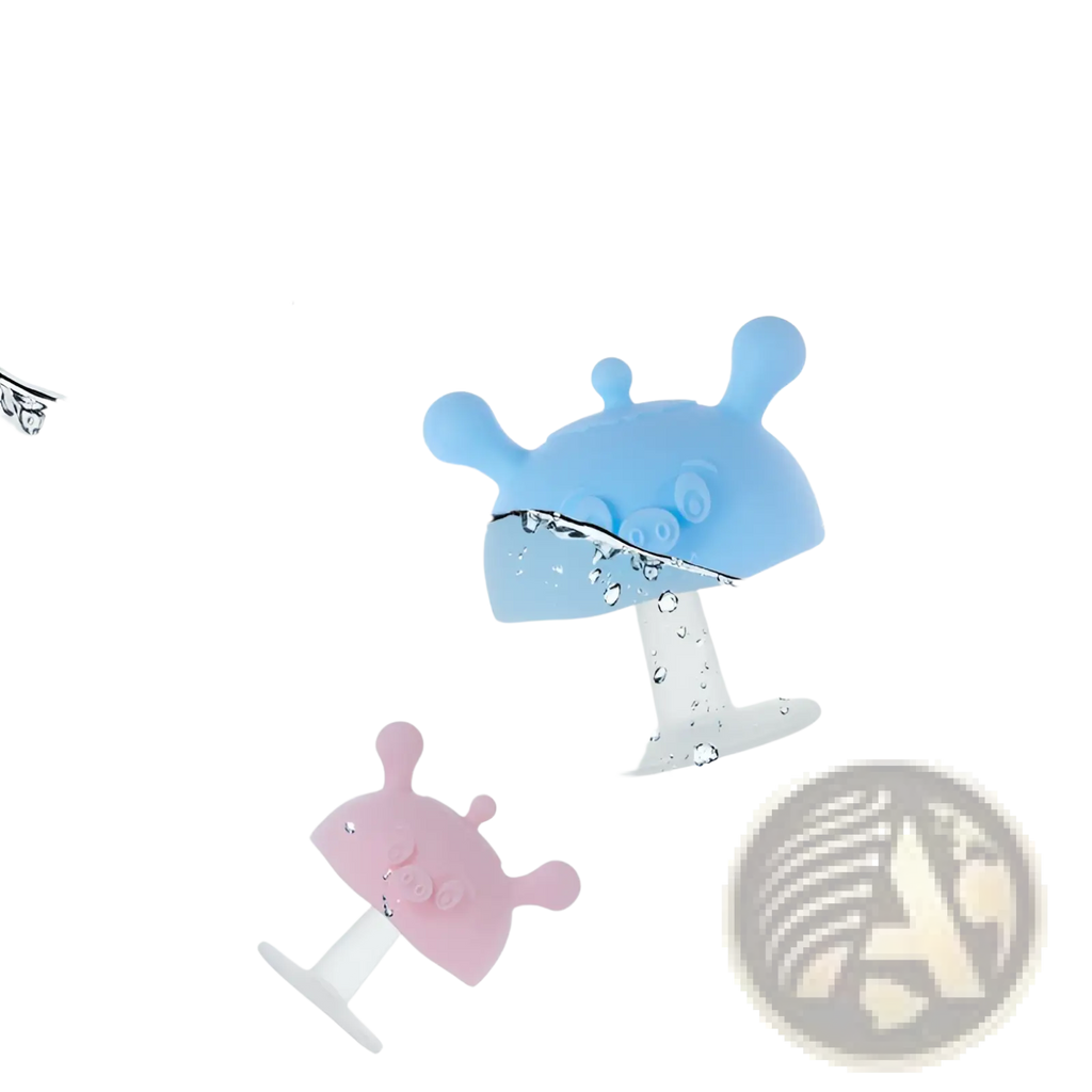 Silicone baby teether and pig shape toothbrush holder in blue and pink with rounded monster-like shapes made of silicone