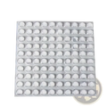 A sheet of 100 clear silicone bumpers transparent round dome shaped protective furniture pads arranged in a grid pattern