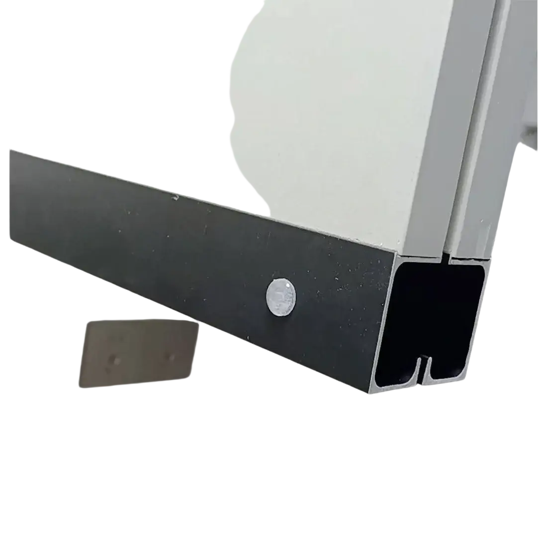 Black aluminum extrusion with silver screw head mounted on surface showing silicone bumpers transparent furniture protection pads