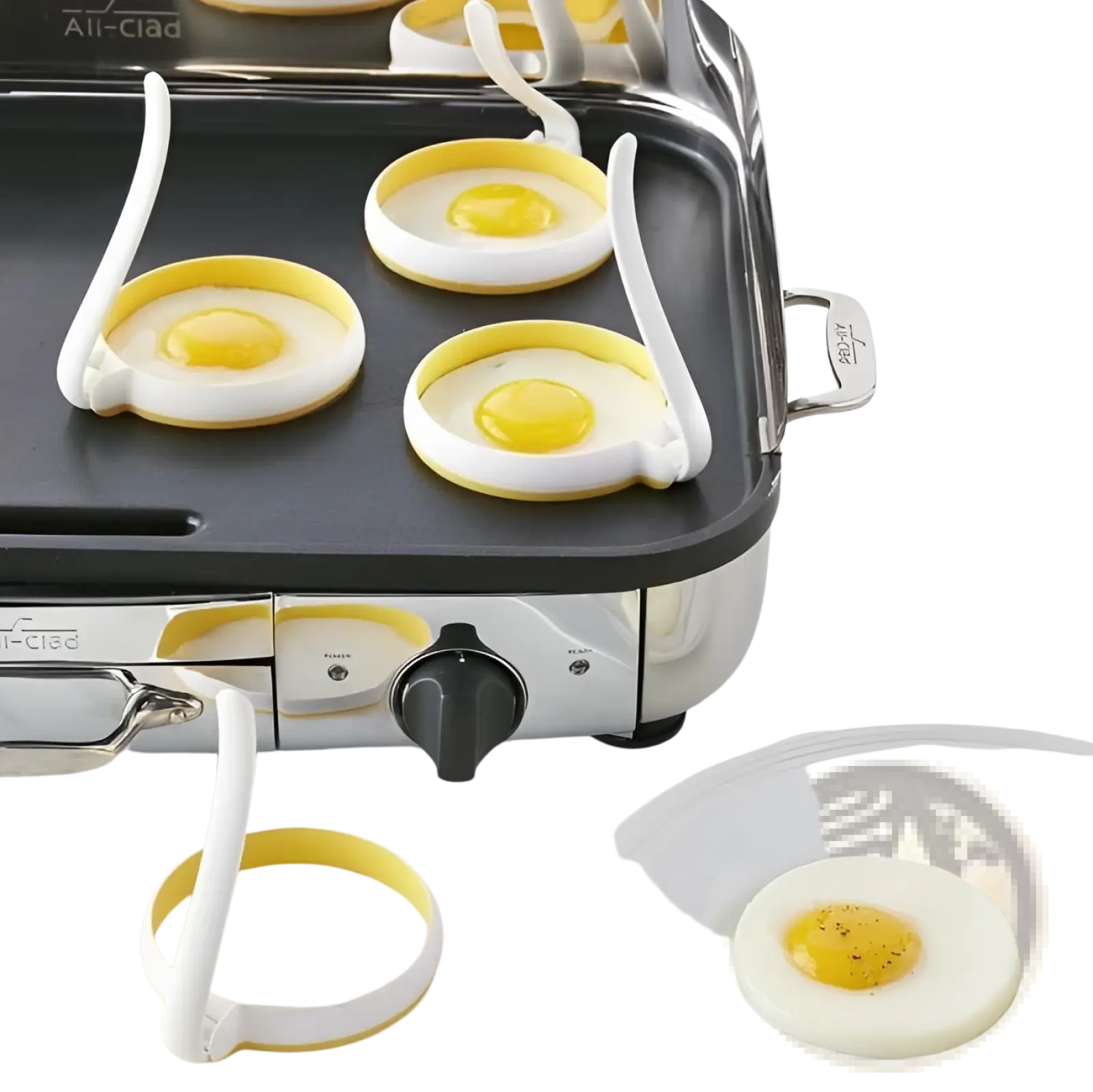 Silicone egg ring round omelette mold in white and yellow with flexible handles for cooking perfectly round fried eggs on griddle