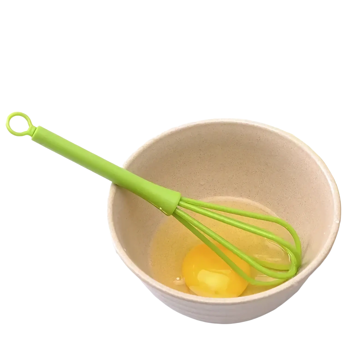 Green silicone egg whisk resting in beige ceramic bowl with cracked yolk kitchen hand mixer tool