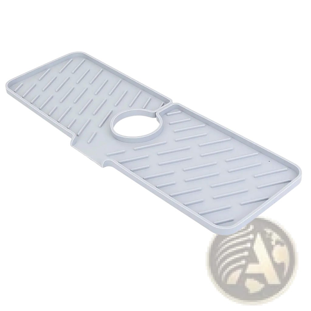 Light gray silicone faucet mat with textured surface and central circular cutout for kitchen sink splash guard pad