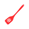 Red silicone kitchen turner spatula with three parallel slots on the blade for efficient cooking and flipping tasks