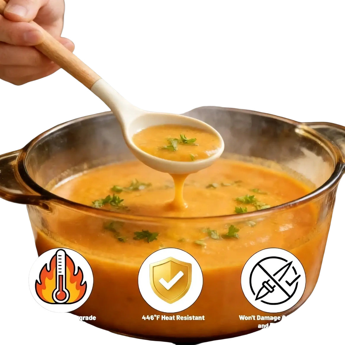 White silicone ladle with wooden handle lifting steaming orange soup from glass pot in silicone kitchen utensils set 14 piece
