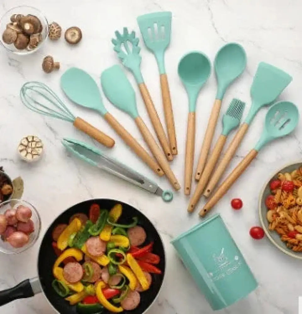 Set of teal silicone and wood heat resistant cooking utensils with wooden handles for safe kitchen use