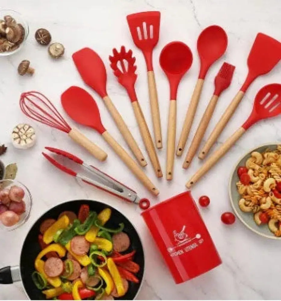 Red silicone and wood heat resistant cooking utensil set with wooden handles for kitchen use
