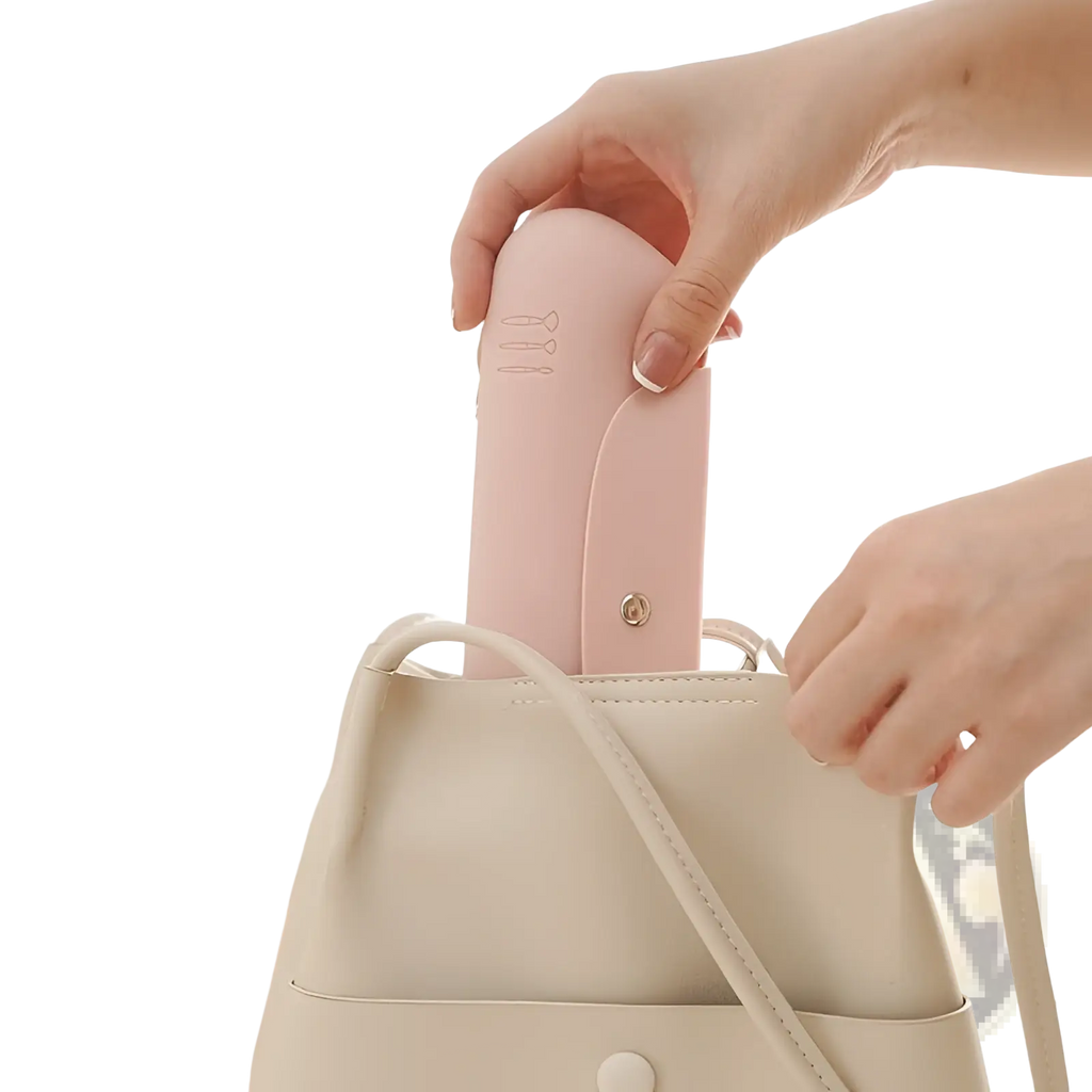 Silicone makeup brush travel bag pink case with a compact blush-pink foldable umbrella and minimalist embossed design
