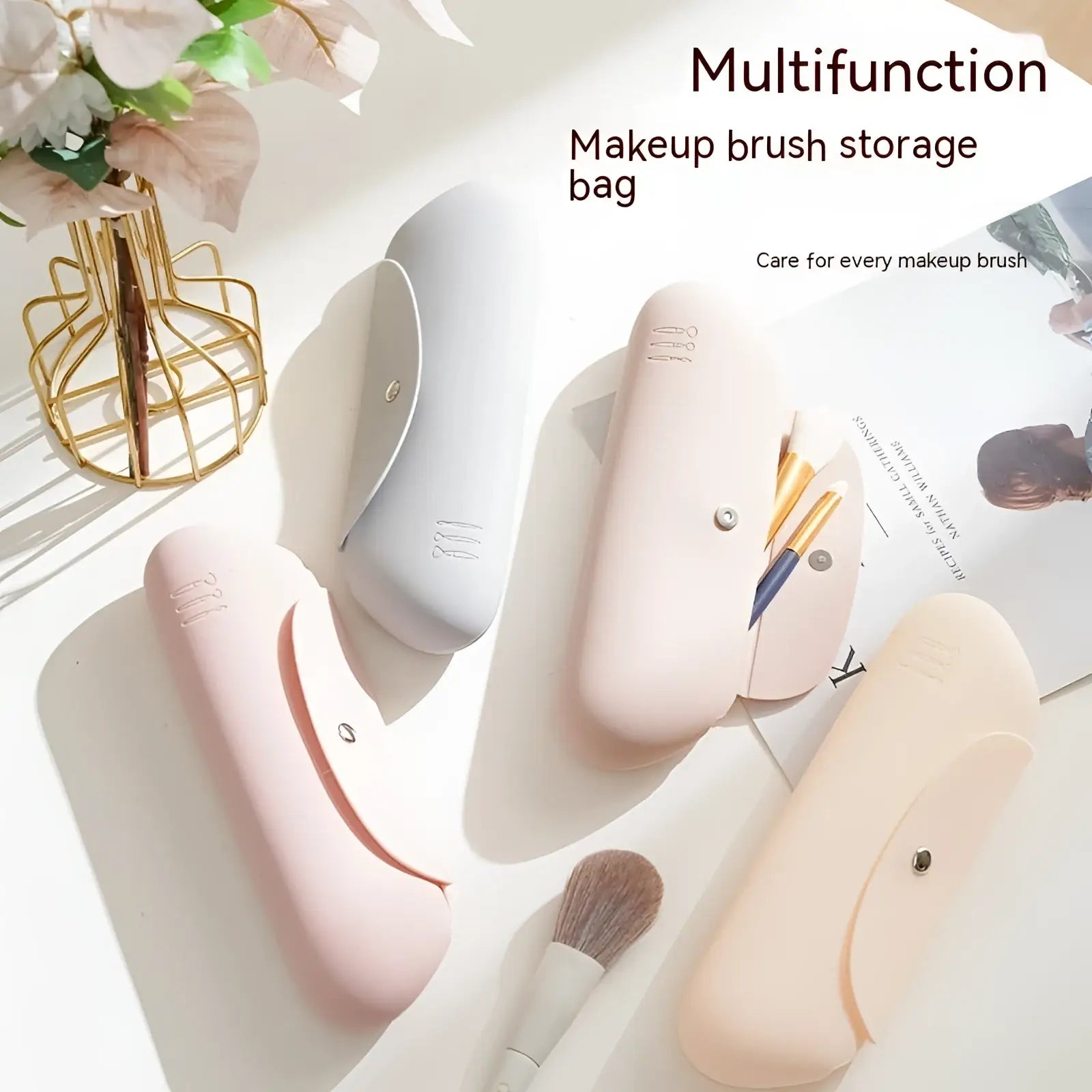 Pastel pink silicone makeup brush travel bag with sleek minimalist design and subtle embossed logo