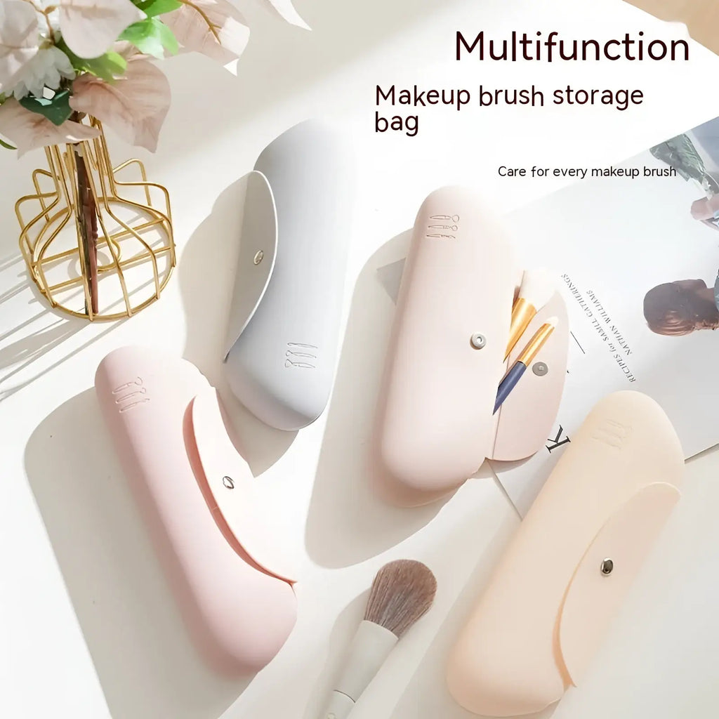 Pastel pink silicone makeup brush travel bag with sleek minimalist design and subtle embossed logo