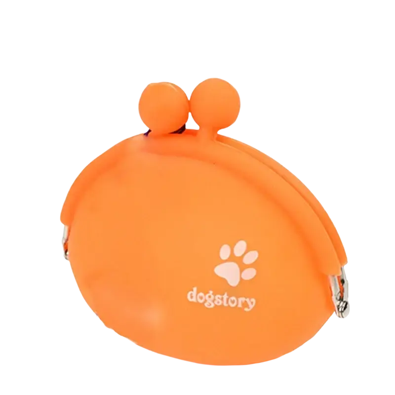 Bright orange silicone pet dog train food snacks pouch with rounded design and soft pom-pom ears by dogstory