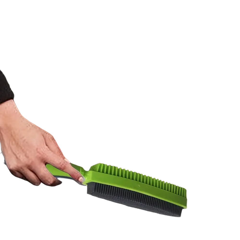 Green and black dual-sided silicone pet hair remover brush with flexible bristles for effective grooming
