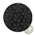 Black circular silicone pet licking mat coaster with raised floral patterns for slow feeder food set use