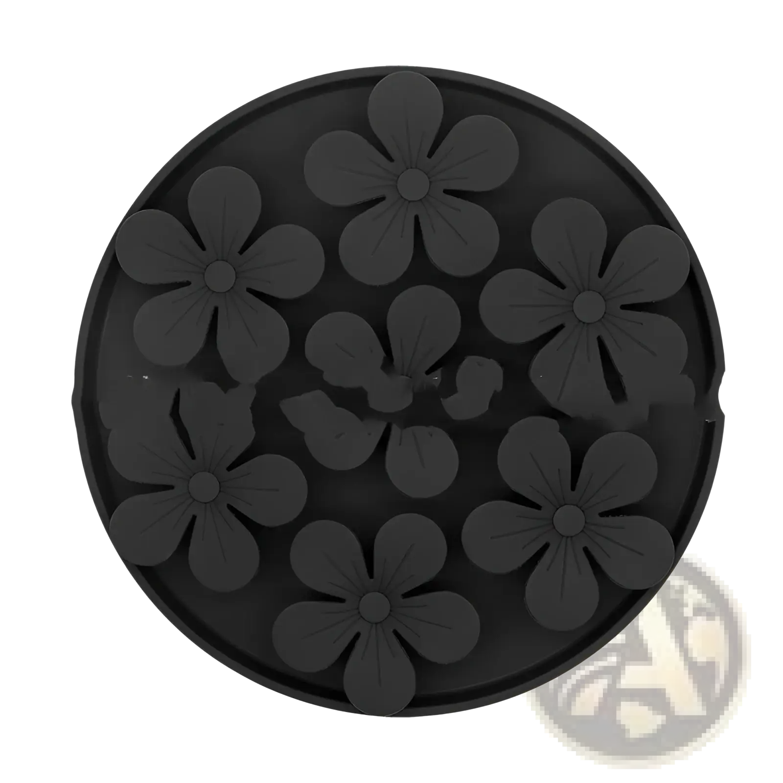 Black circular silicone pet licking mat coaster with raised floral patterns for slow feeder food set use