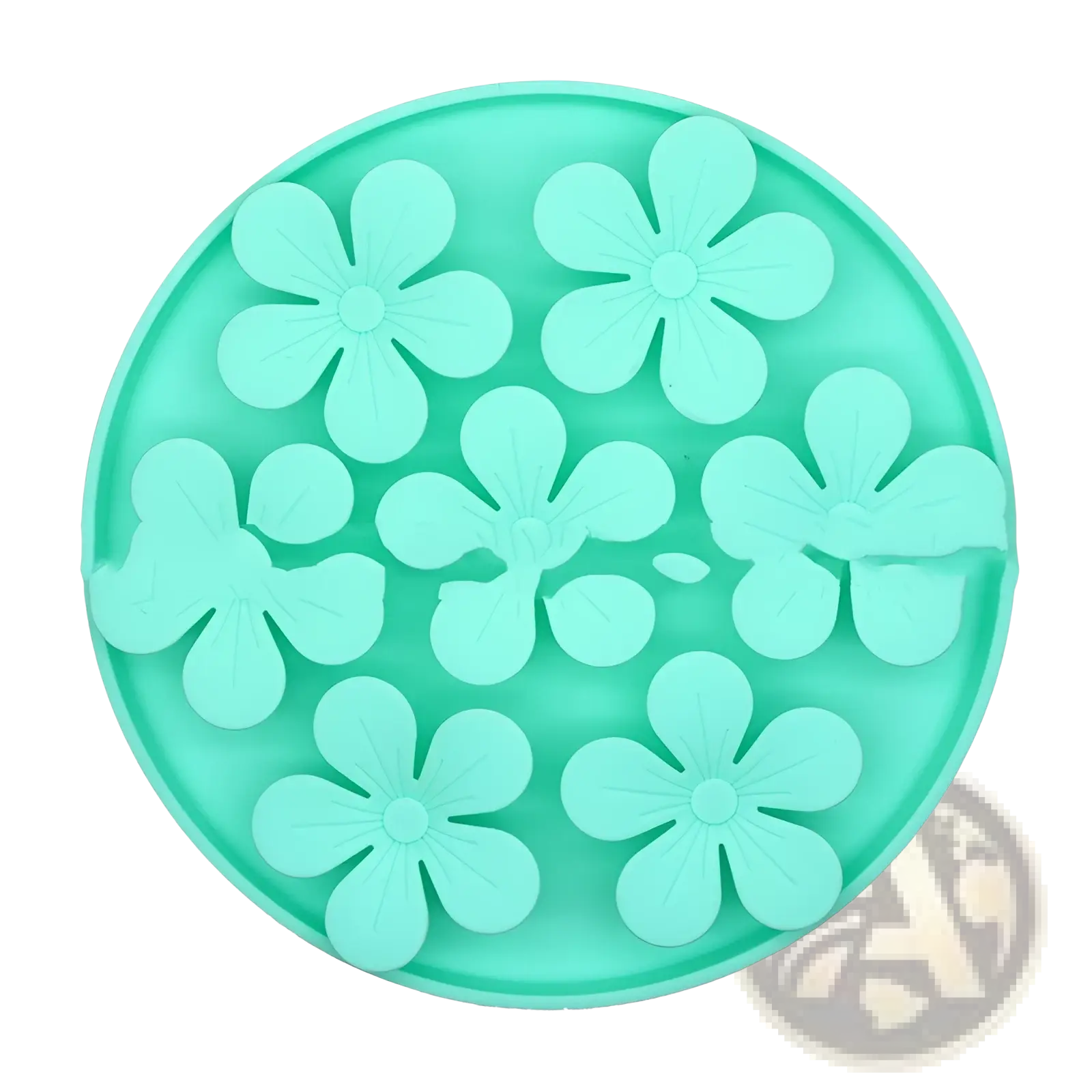 Circular mint green silicone pet licking mat with eight raised flower-shaped cavities for slow feeder use