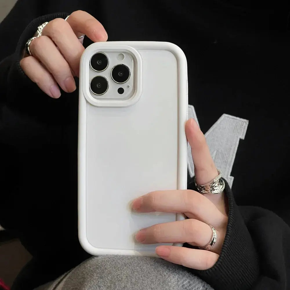 White frosted matte silicone minimalist phone case with raised camera cutout shown from the back for iphone 13 pro