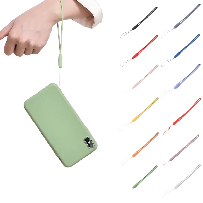 A soft matte sage green silicone phone case with a matching wrist strap shown from the back side