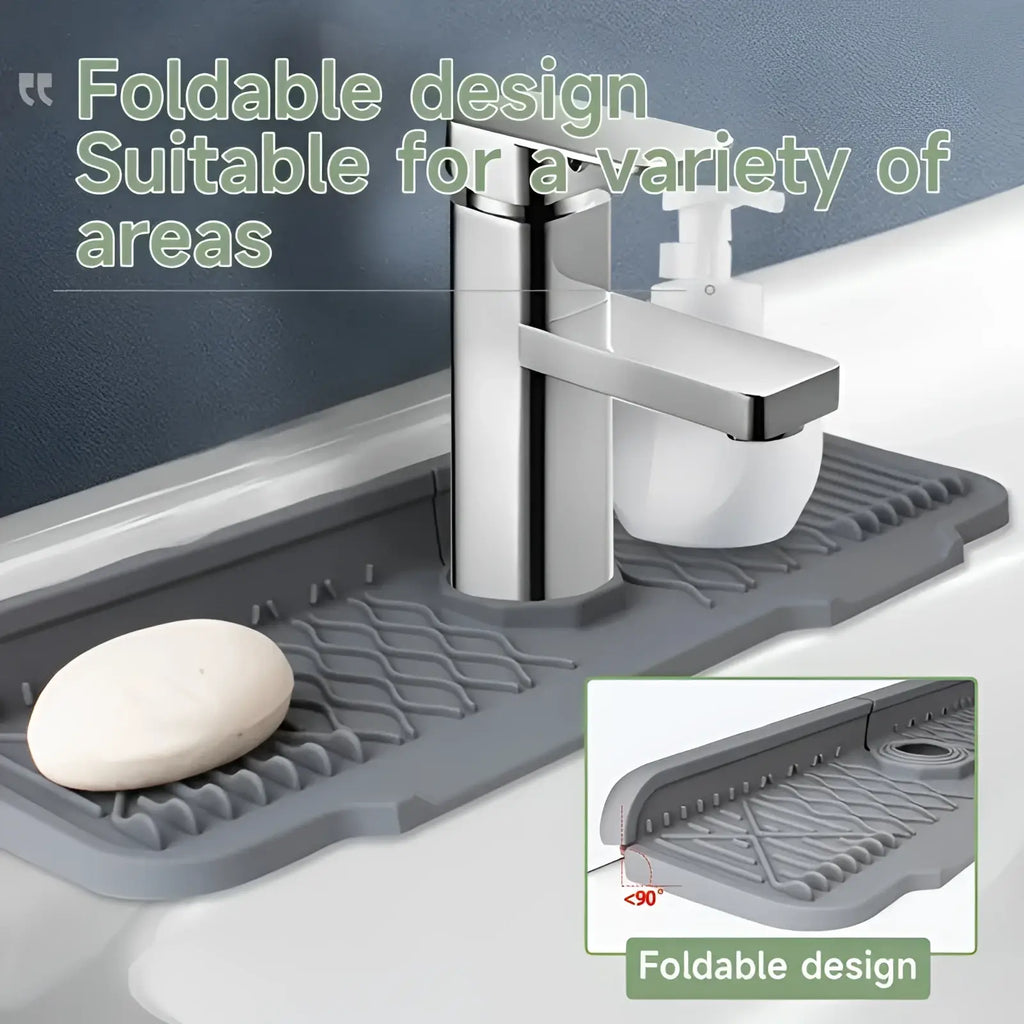 Gray foldable silicone self draining kitchen sink faucet mat with textured grid surface and raised edges for soap holders