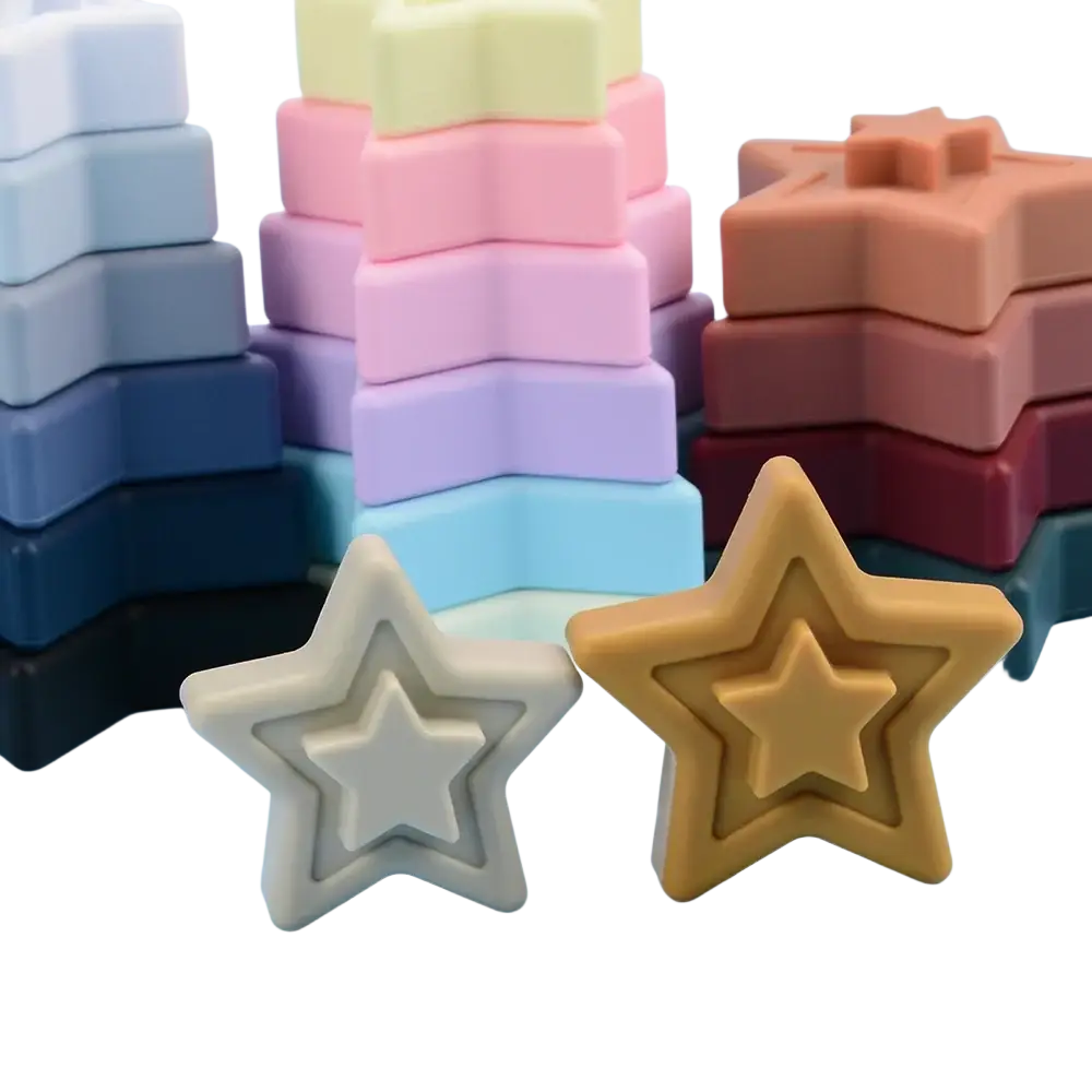 Soft silicone star-shaped stacking blocks in pastel and earthy tones for Montessori toy learning