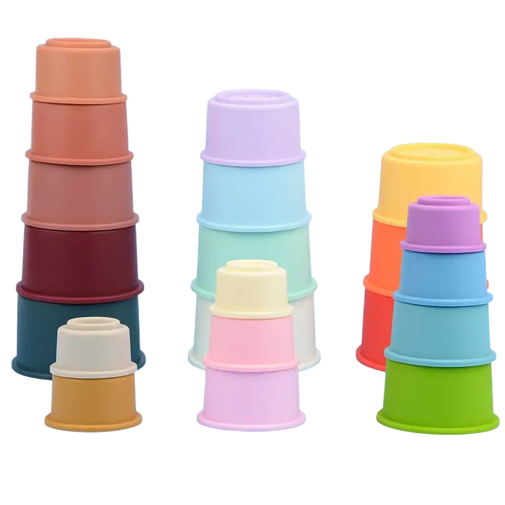 Stackable silicone stacking blocks in pastel and earthy tones designed as Montessori toys for early learning