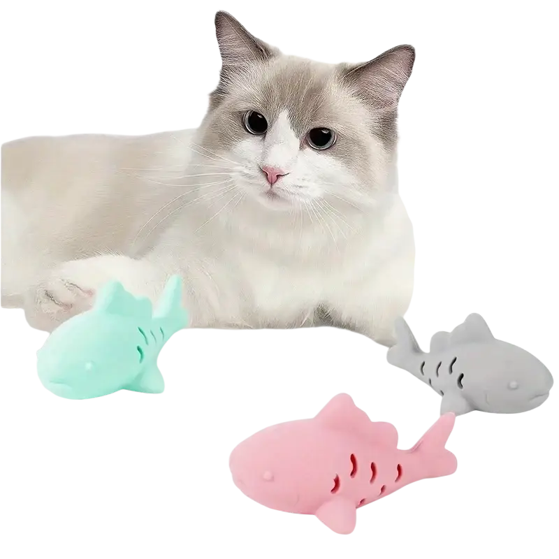 Silicone treat dispensing fish toy for small pets in pastel colors with textured surfaces and cut-out details