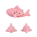 Pink silicone shark-shaped treat dispensing fish toy with perforated body and rounded fins for small pets