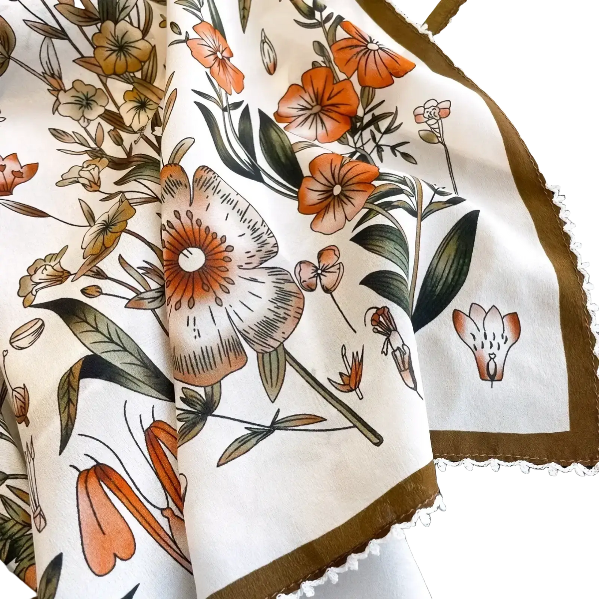 Cream-colored silk floral square scarf with detailed orange brown green botanical print and scalloped brown trim