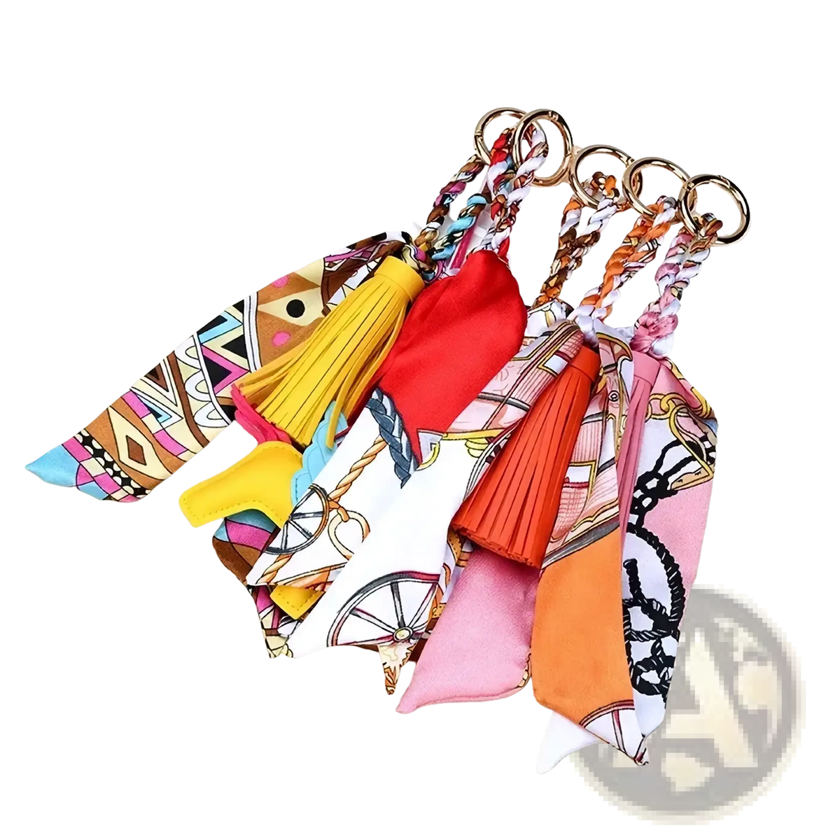 Silk scarf tassel keychains for bags featuring colorful patterned silk with gold toned rings and tassels
