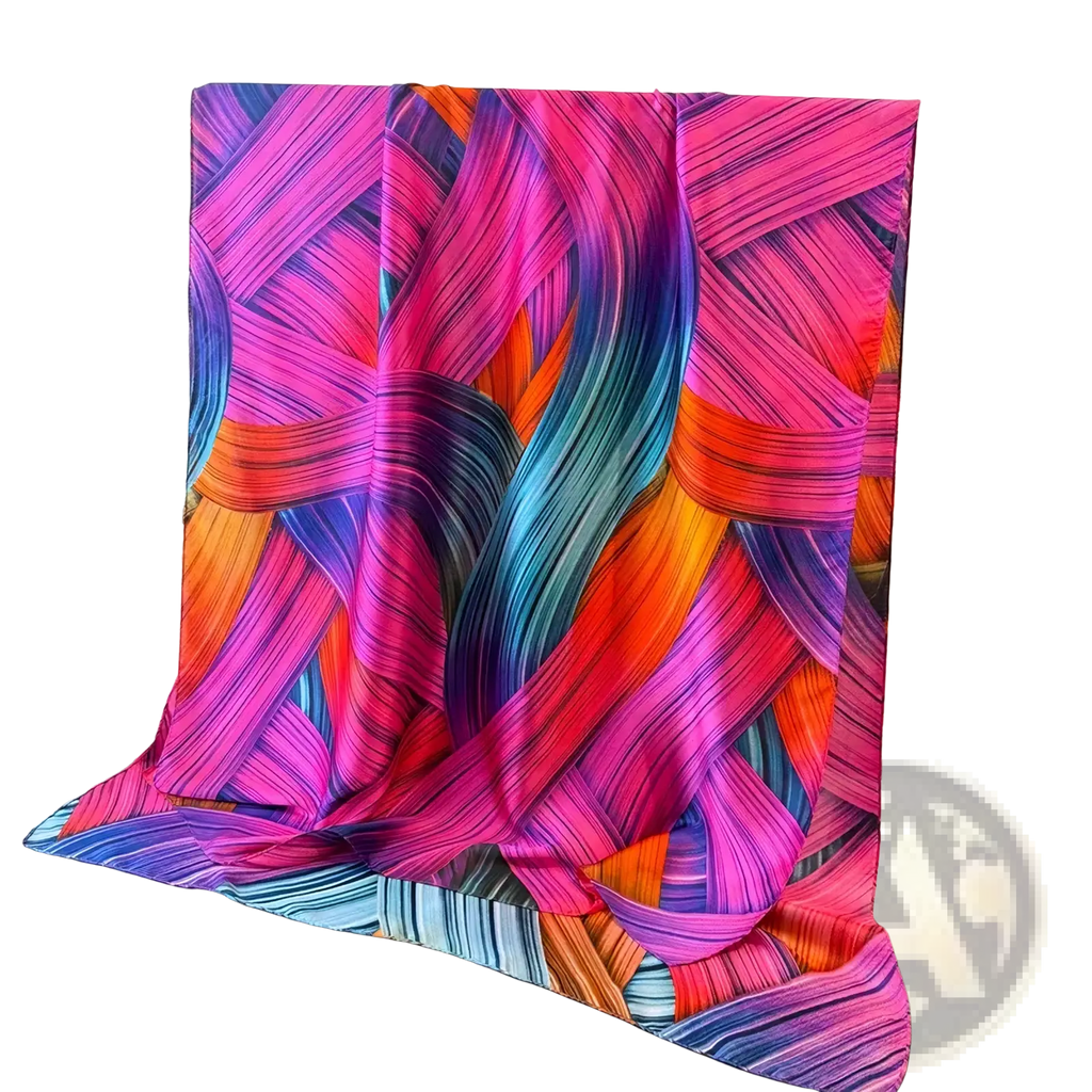 A vibrant abstract-patterned silk scarf in bold pink purple orange and blue for women colorblock spring shawl wrap