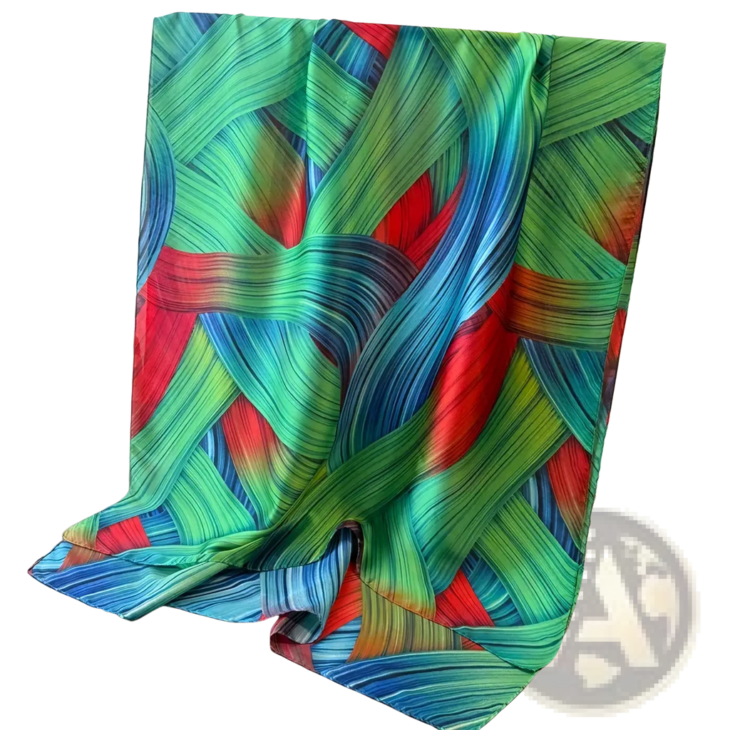 Vibrant abstract silk scarf for women featuring flowing green blue and red ribbon-like patterns in a spring shawl wrap