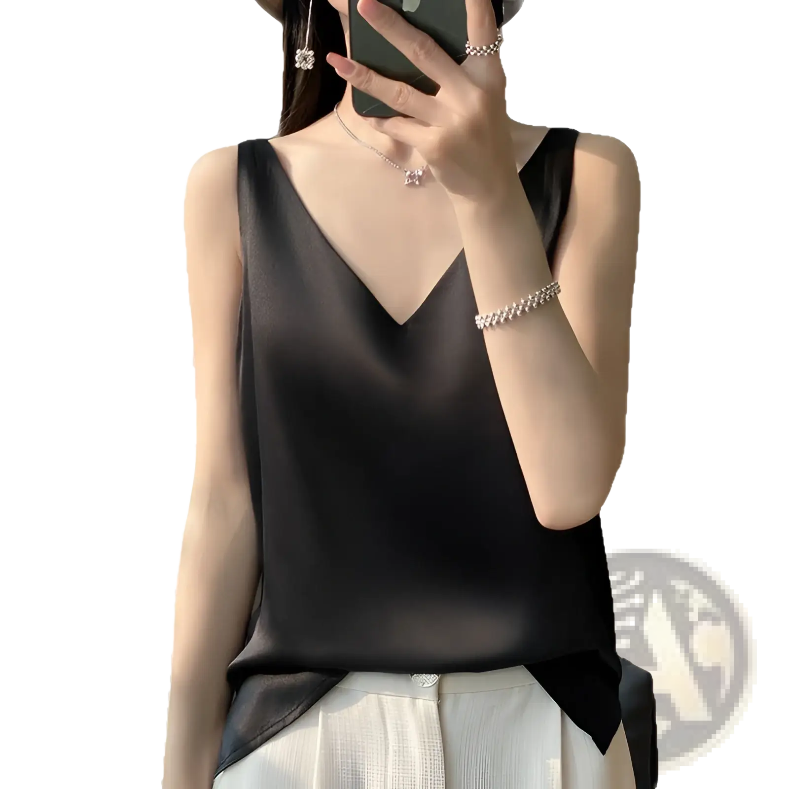 Black satin sleeveless camisole top with deep v-neckline and asymmetrical hem in silky satin material