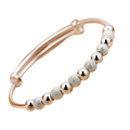Silver beaded bangle bracelet for women featuring alternating polished and textured spherical silver beads adjustable fit
