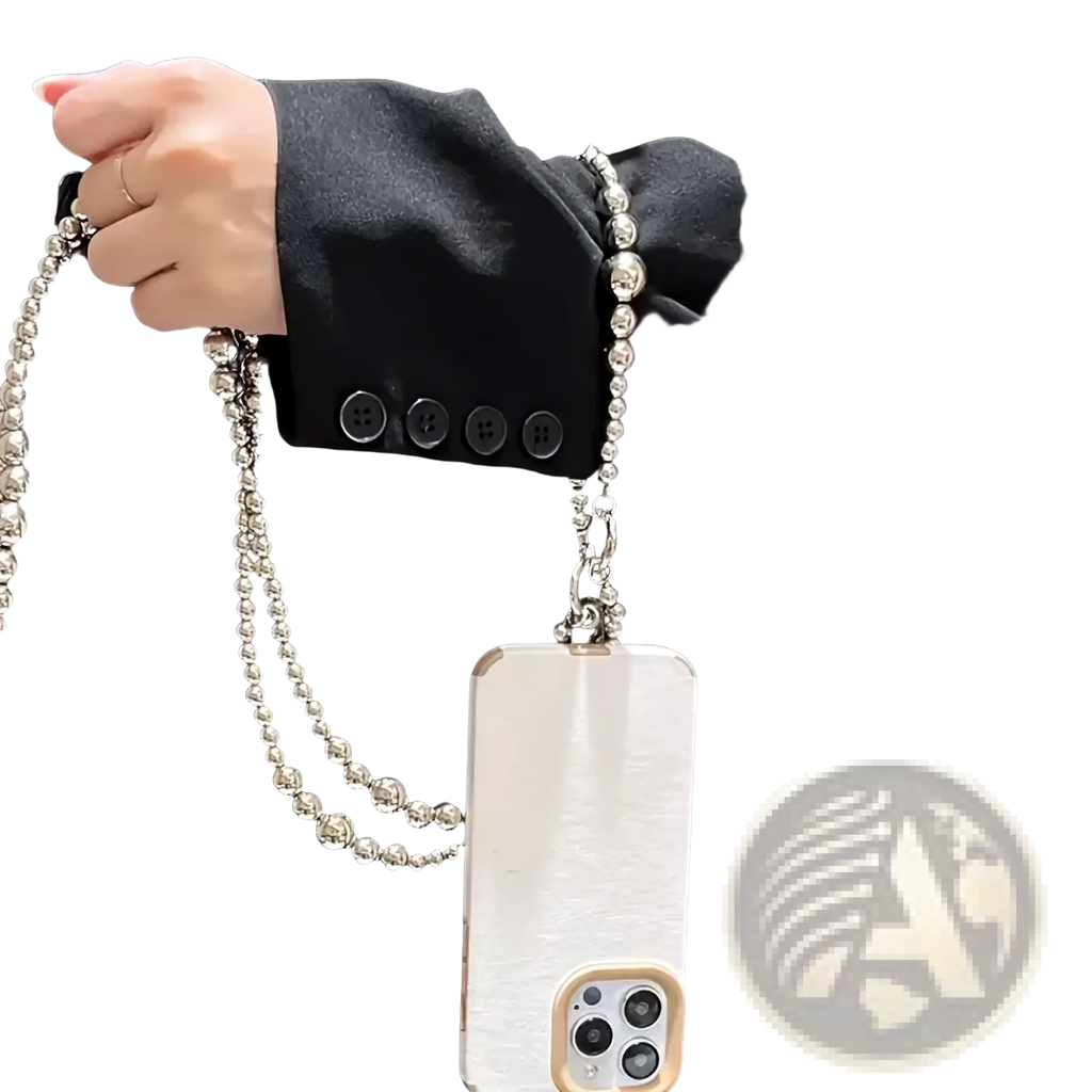 A sleek white phone case with a textured finish featuring an elegant silver beaded charm strap and wallet chain