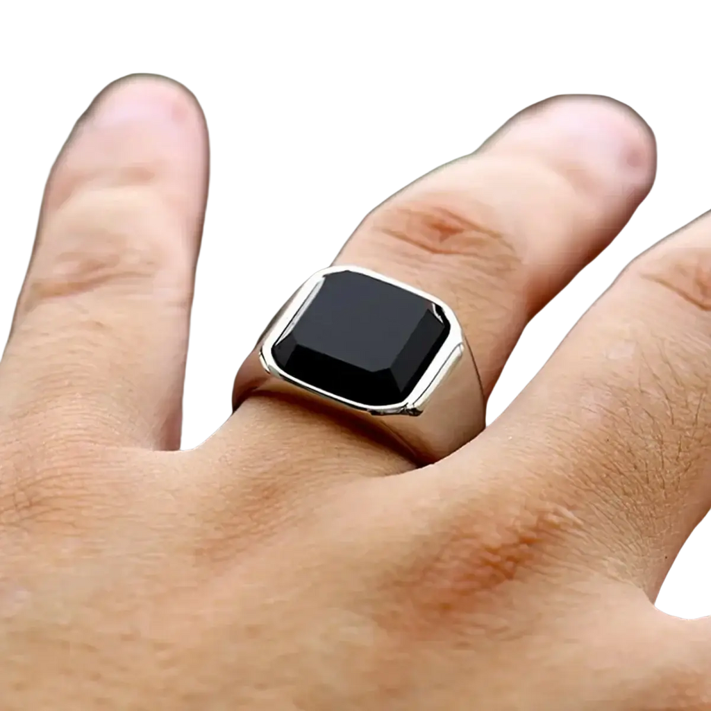 A sleek silver signet ring for men and women featuring a square-cut black onyx stone in a polished metal band