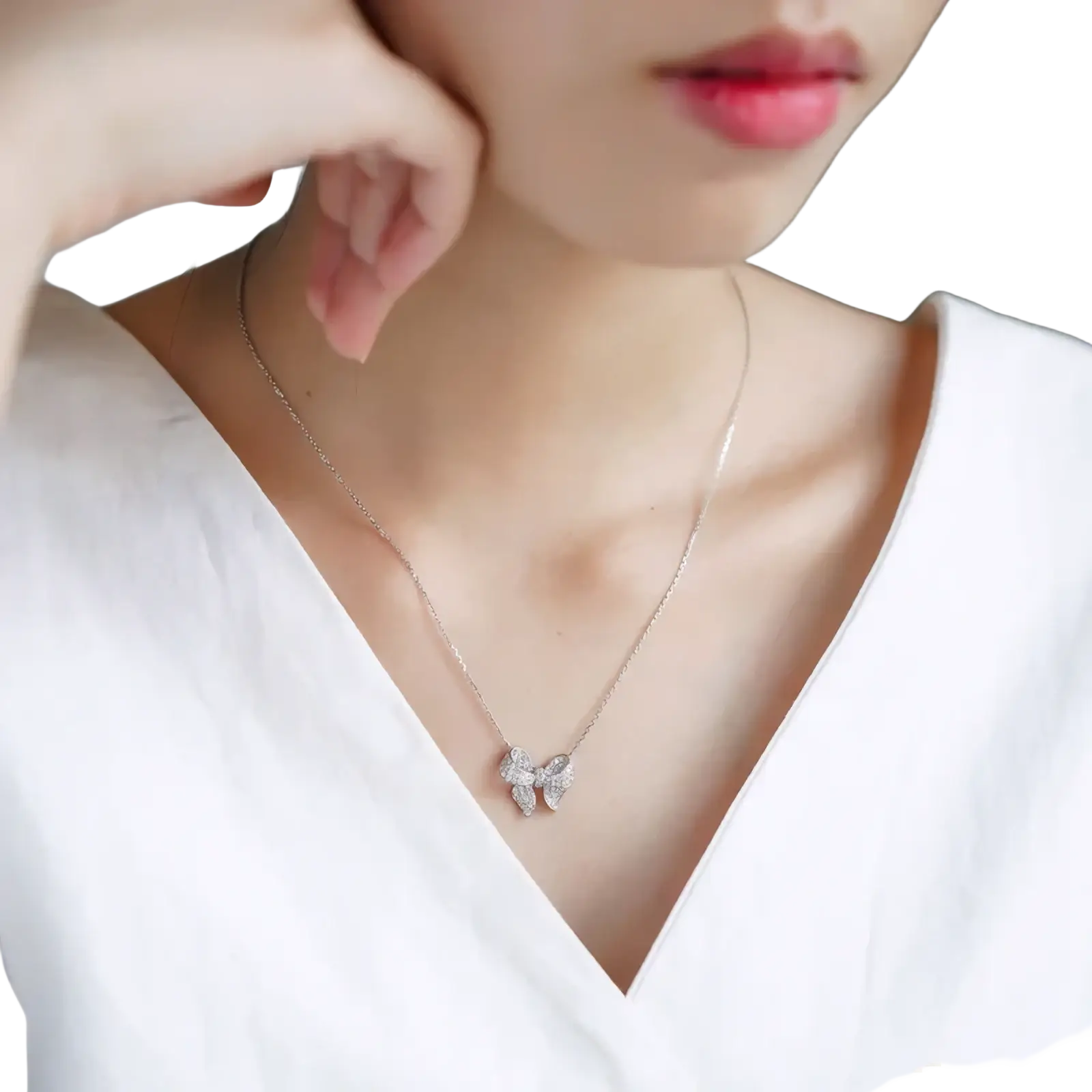 Silver bowknot zircon necklace with a delicate silver chain and a sparkling bow pendant adorned with clear stones