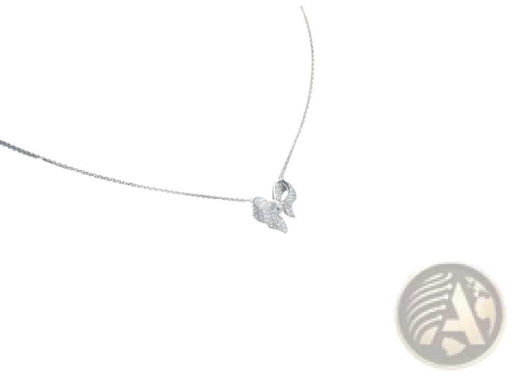 Silver bowknot zircon necklace and earrings set featuring a delicate silver butterfly pendant necklace with sparkling gemstones